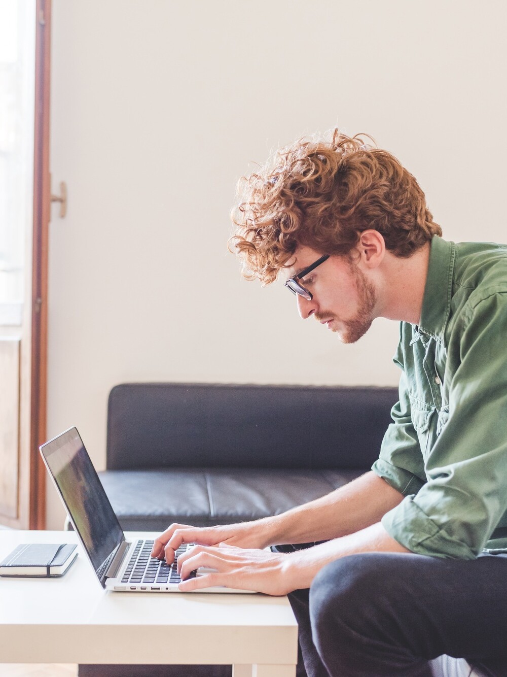 Young man business working computer at home