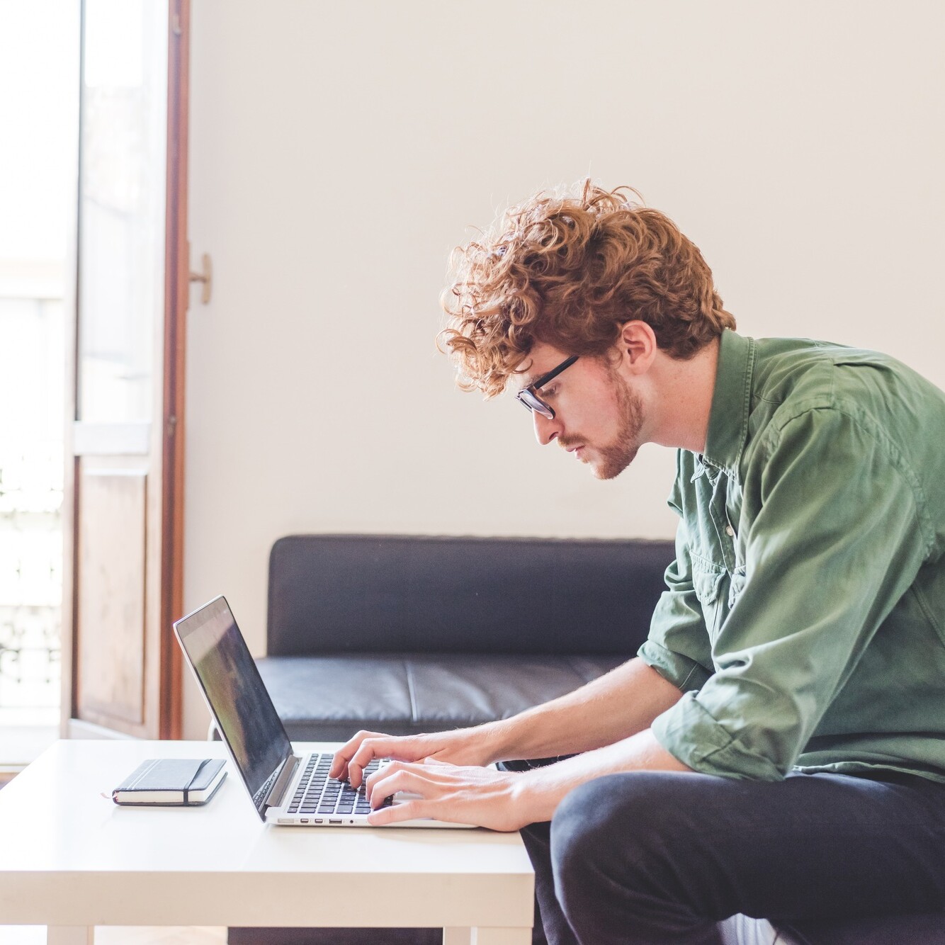 Young man business working computer at home